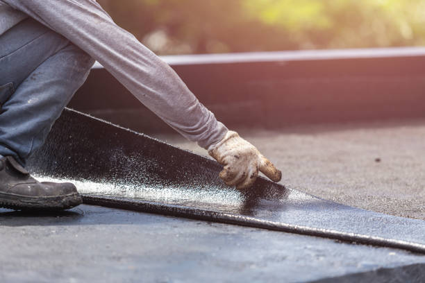 Professional Basement Waterproofing technician working in West Henrietta, NY